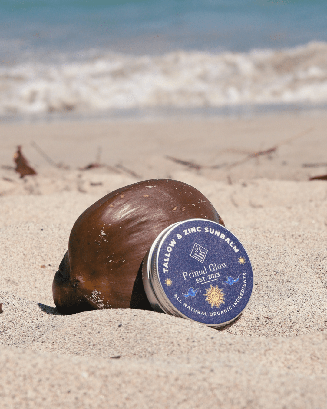 Primal Glow tallow en zink minerale zonnebalsem SPF 50 in verpakking